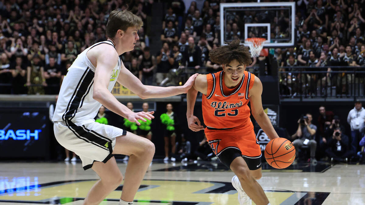 Illinois’ Keaton Wagler, a former Shawnee Mission Northwest star, drives to the basket against Daniel Jacobsen of the Purdue Boilermakers during the first half at Mackey Arena on January 24, 2026 in West Lafayette, Indiana.