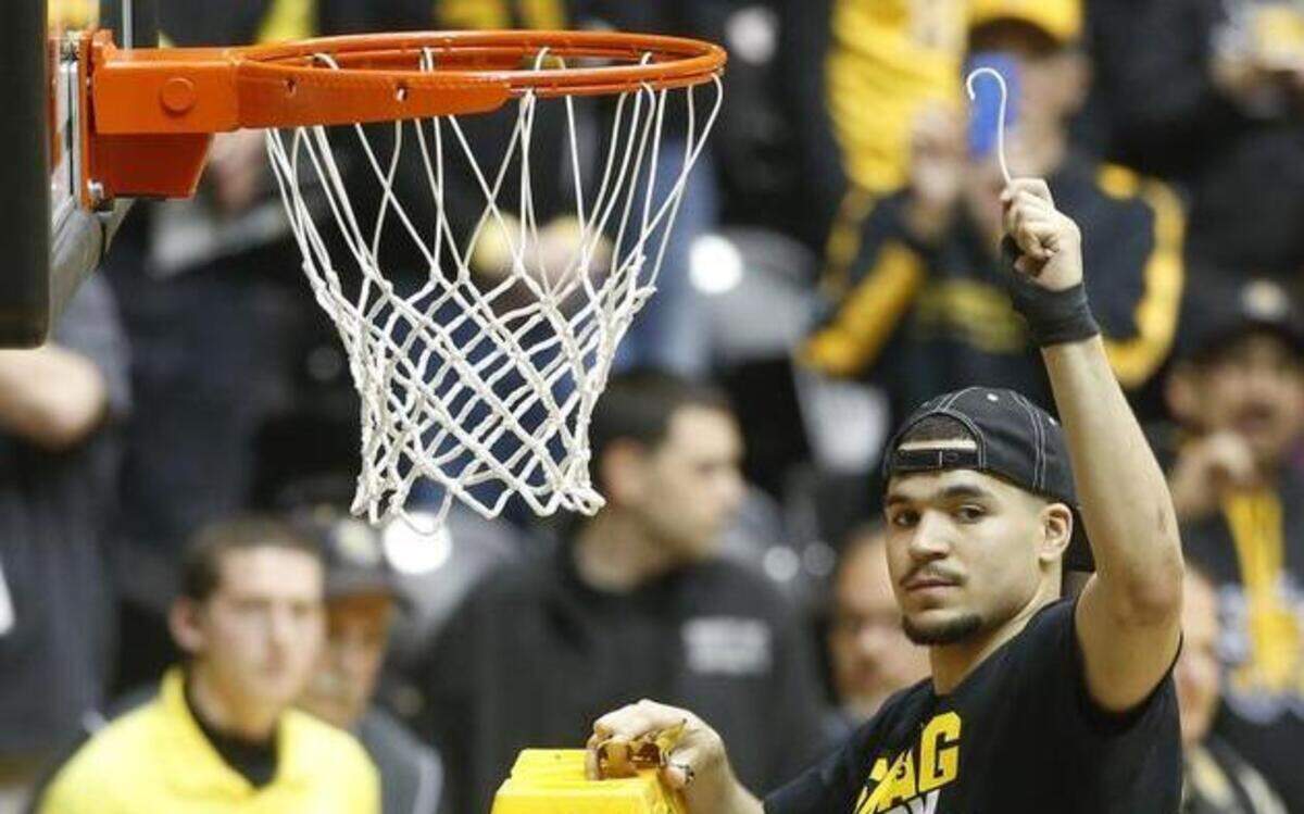 
Wichita State’s Fred VanVleet held up a piece of the net after the Shockers defeated Northern Iowa, 74-60, to win the Missouri Valley Conference title last month.
