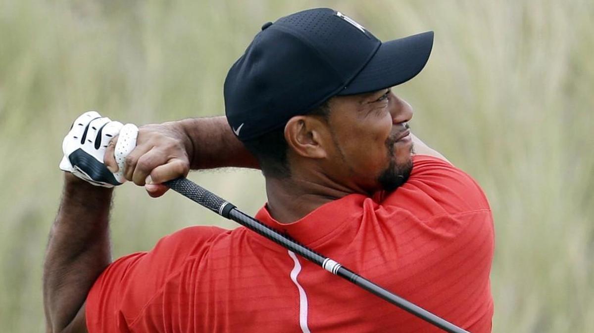 In this Dec. 4, 2016, file photo, Tiger Woods watched his tee shot on the third hole during the final round at the Hero World Challenge golf tournament in Nassau, Bahamas.