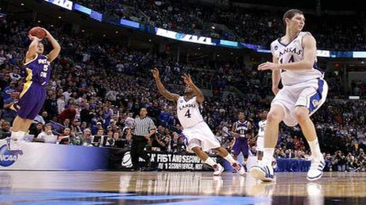 
Northern Iowa guard Ali Farokhmanesh was wide open when he popped a three-pointer at near the end of the game as Kansas guard Sherron Collins scrambled to cover him during the NCAA Tournament in 2010.
