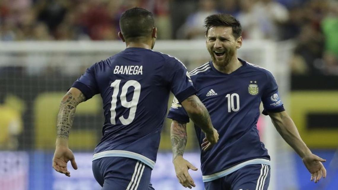 Argentina midfielder Lionel Messi (right) celebrated his goal against the United States with midfielder Ever Banega during a Copa America Centenario semifinal match Tuesday in Houston.