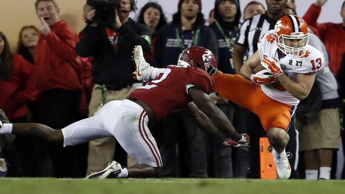 Clemson’s Hunter Renfrow caught the winning touchdown pass in front of Alabama’s Tony Brown on Monday night.