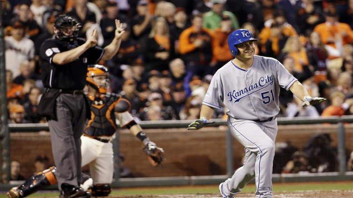 
Kansas City Royals' Jason Vargas laughs after he realized the count was 3-2 and not a walk during the third inning of game four of the World Series on Saturday.
