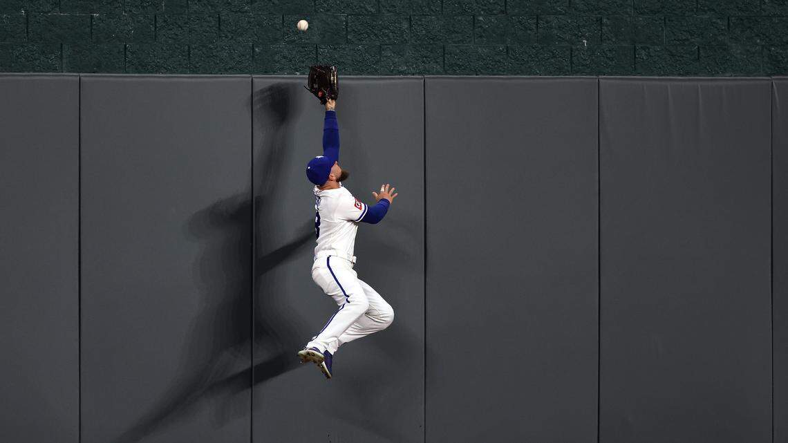The Royals’ Kyle Isbel unsuccessfully tried to catch a grand slam by the Orioles’ Leody Taveras.