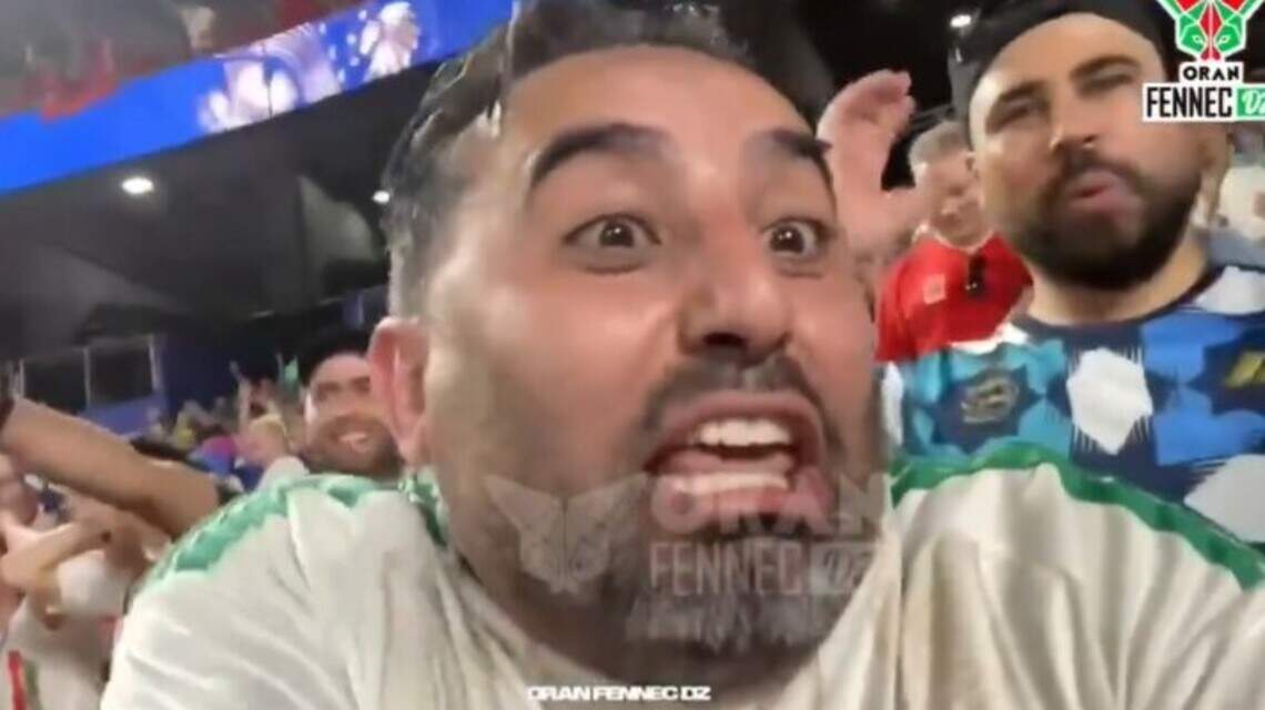 Karma hit an Algeria fan caught taunting an Austria fan at KC World Cup match