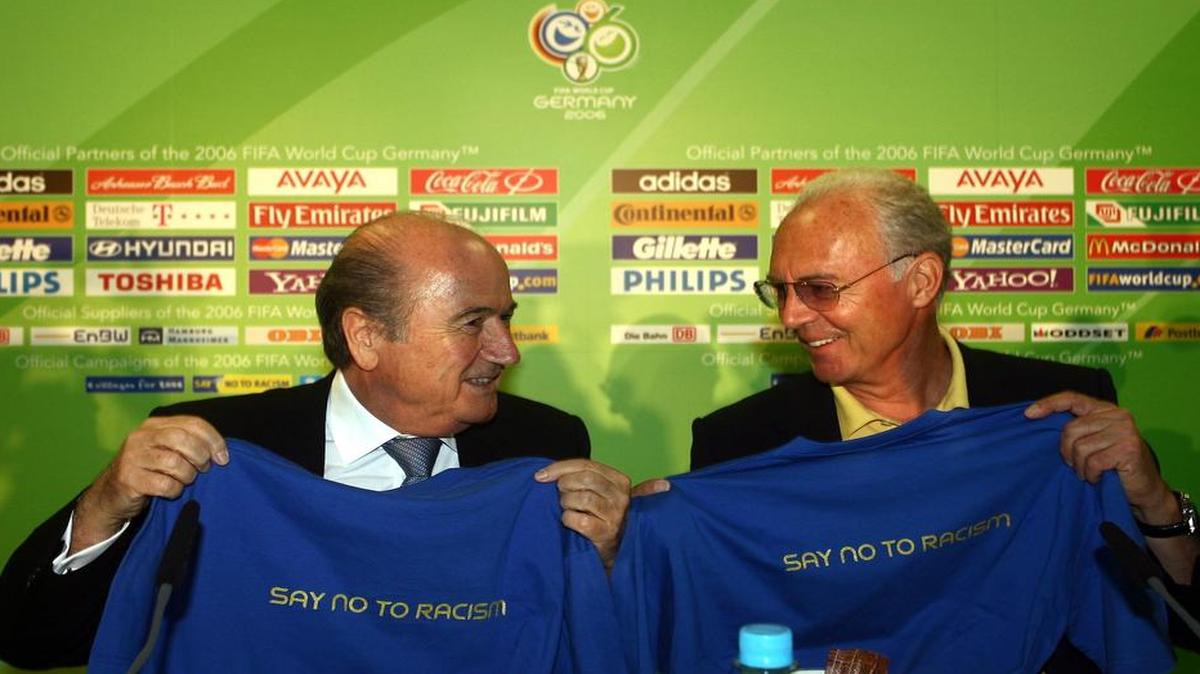 
FIFA President Joseph Blatter (left) and German Organization Committee President Franz Beckenbauer displaed shirts to promote the FIFA campaign 'Say No To Racism' during a news conference at the Olympic Stadium in Berlin during the 2006 World Cup.
