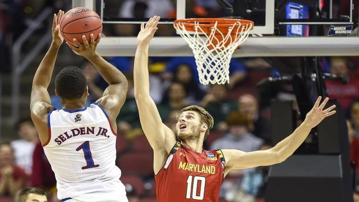 Kansas Jayhawks guard Wayne Selden Jr. shot over Maryland Terrapins forward Jake Layman in the second half of Thursday’s game.