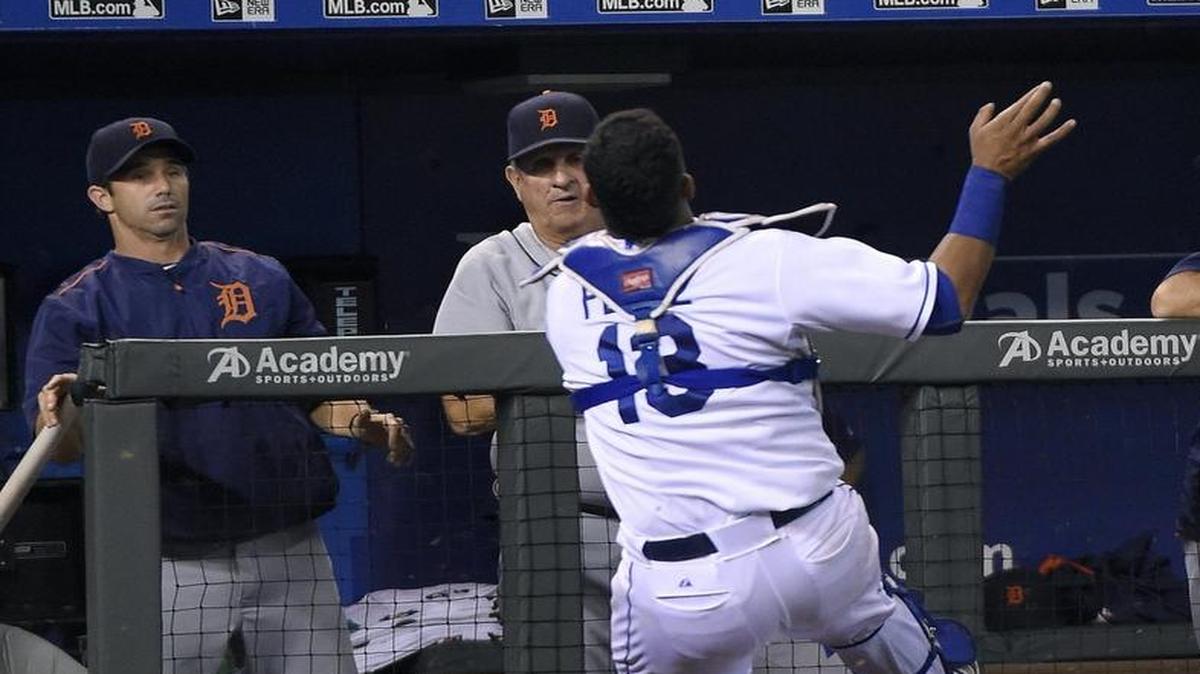 
Kansas City Royals catcher Salvador Perez ran down a pop foul ball for an out on Detroit Tigers’ Andrew Romine in front of manager Brad Ausmus and bench coach Gene Lamont to end the top of the fifth inning.
