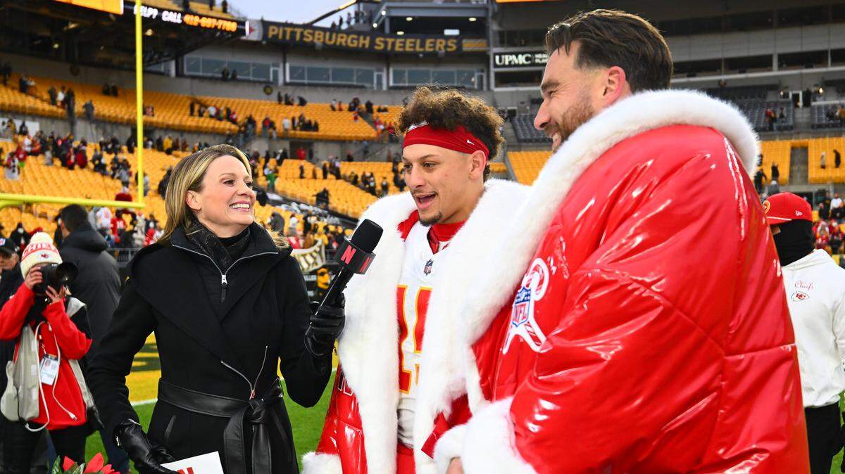 The Chiefs’ Patrick Mahomes and Travis Kelce talk with a Netflix reporter after the game against the Pittsburgh Steelers at Acrisure Stadium on Dec. 25, 2024 in Pittsburgh, Pennsylvania.