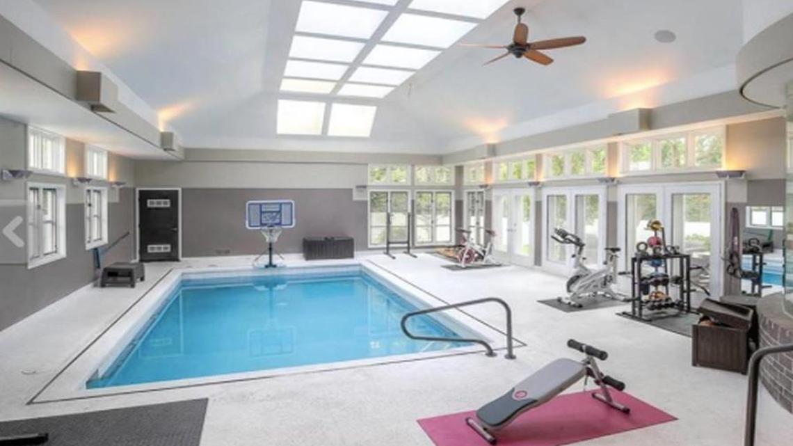 There is a pool, bar and sauna in this room.