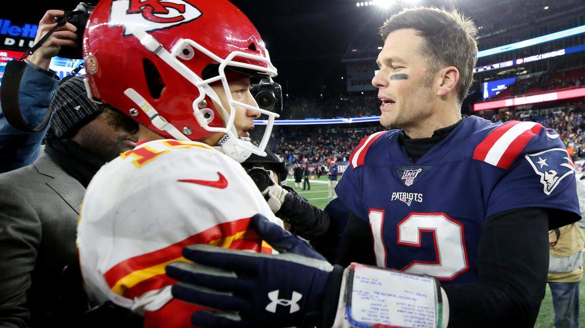 Tom Brady of the New England Patriots talks with Patrick Mahomes of the Kansas City Chiefs after the Chiefs defeated the Patriots 23-16 at Gillette Stadium on Dec. 8, 2019 in Foxborough, Massachusetts.
