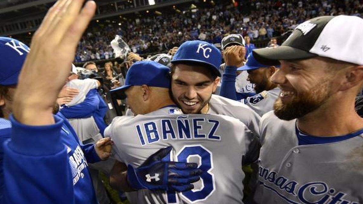 
Raul Ibanez hugged Eric Hosmer as the Kansas City Royals celebrate making the playoffs in Chicago, Ill. Royals beat the White Sox 3-1 to claim their first play-off birth since 1985.

