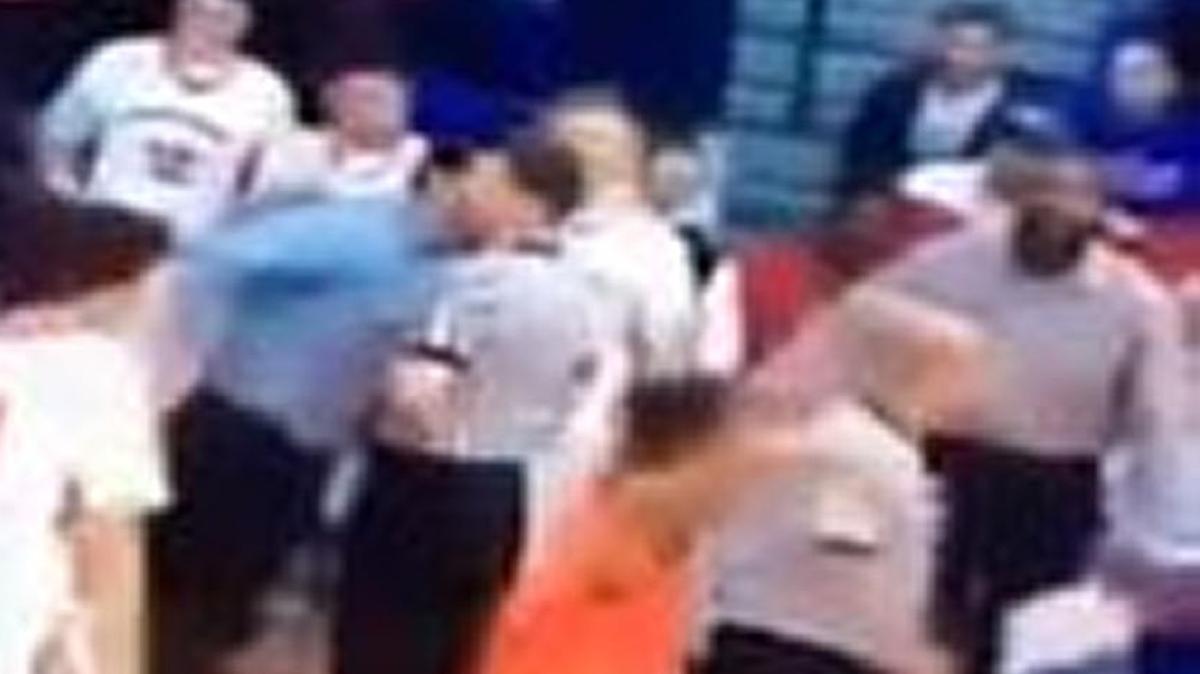 A high school coach is in trouble after apparently headbutting a referee.