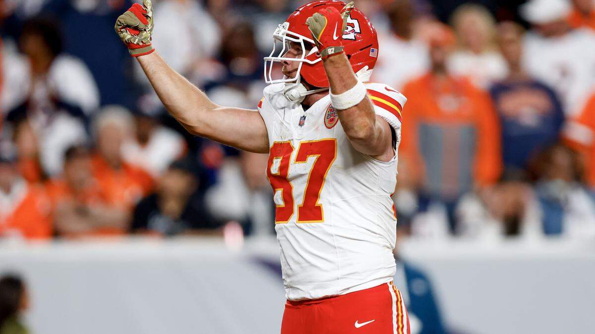 Travis Kelce of the Kansas City Chiefs celebrates a touchdown against the Denver Broncos during the fourth quarter at Empower Field At Mile High on Nov. 16, 2025 in Denver, Colorado.