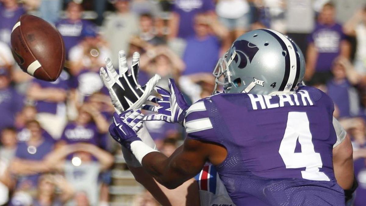
Kansas State wide receiver Dominique Heath reached for a pass from quarterback Joe Hubener during a game against Louisiana Tech in September.
