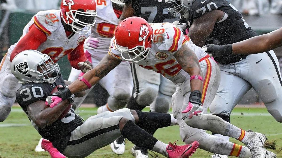 Kansas City Chiefs inside linebacker Derrick Johnson leveled Oakland’s Jalen Richard late in Sunday’s game.