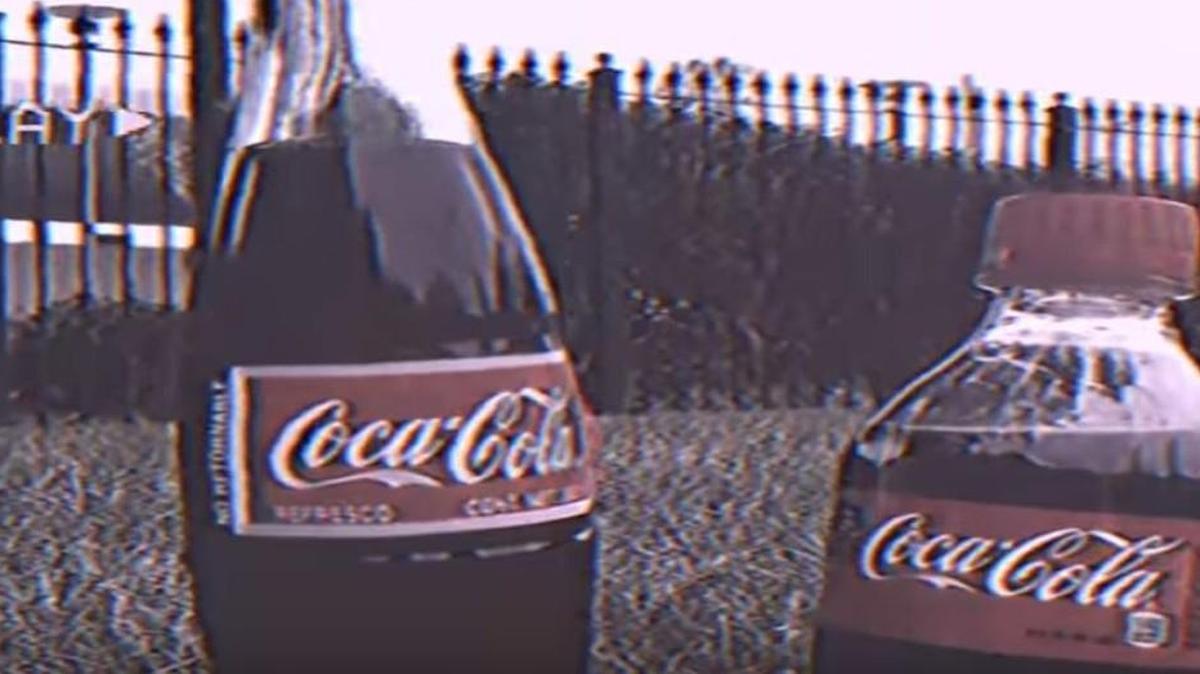 That’s the Coke bottle as a kid (right).