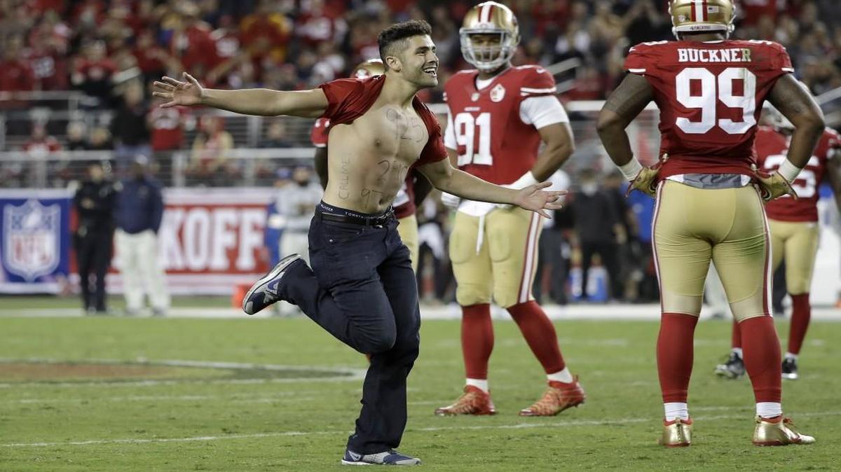 A fan ran on the filed during the second half of an NFL football game between the San Francisco 49ers and the Los Angeles Rams in Santa Clara, Calif., on Monday.