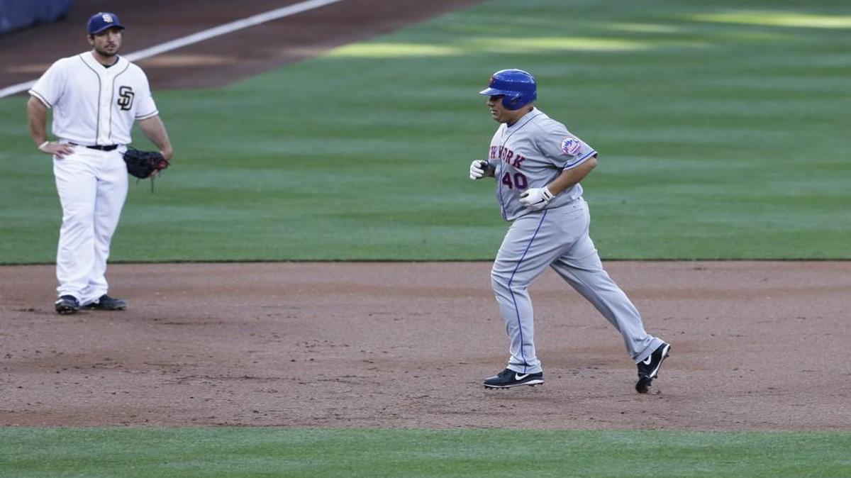 New York Mets pitcher Bartolo Colon roundd the bases after hitting a two-run home run off San Diego Padres starting pitcher James Shields on Saturday night.