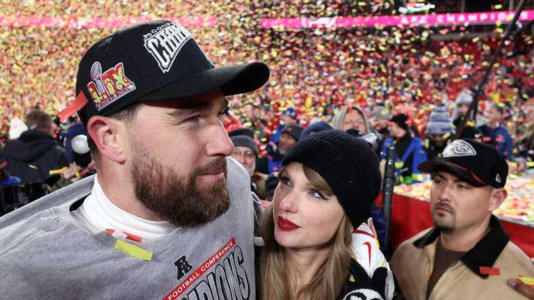 Travis Kelce gave a subtle nod to Taylor Swift before signing Chiefs contract