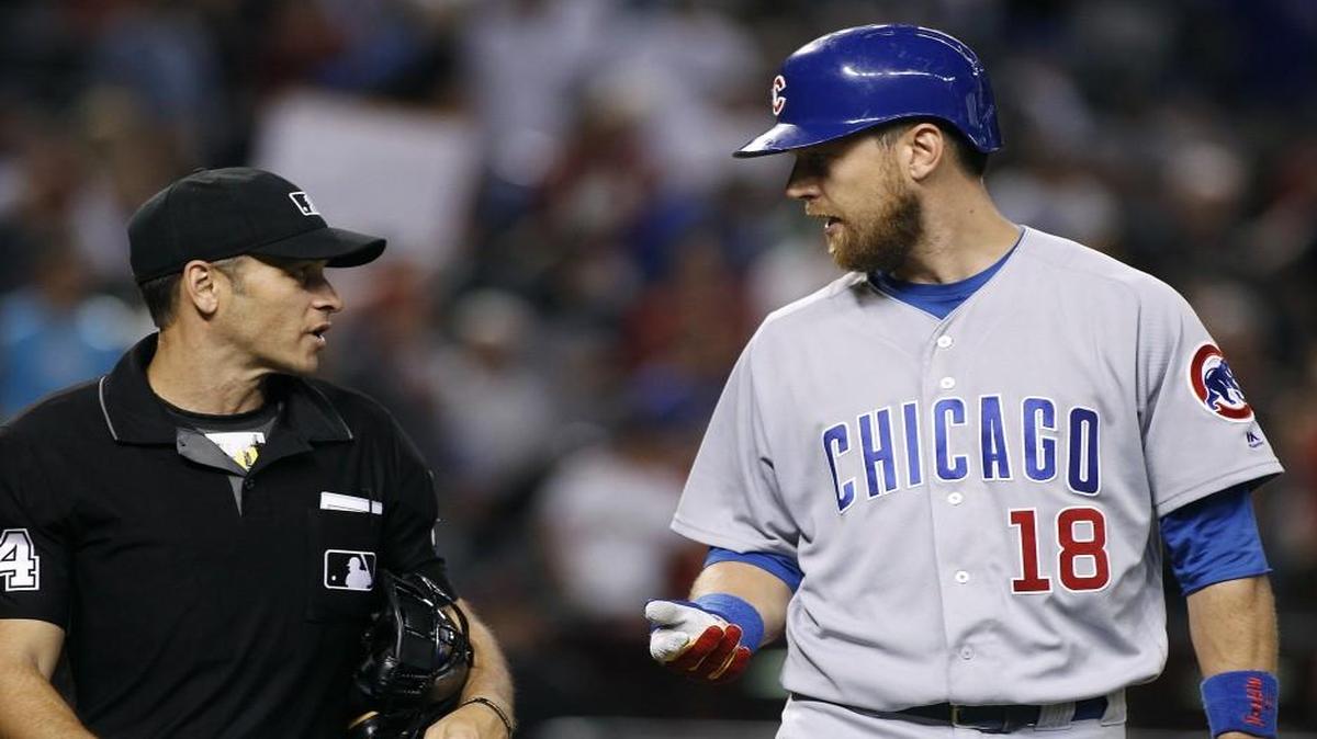 The Cubs’ Ben Zobrist talked with home-plate umpire Mark Wegner after being called out on strikes to end Saturday’s game against the Diamondbacks.