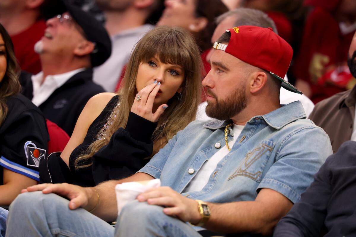 Superstar singer Taylor Swift and Travis Kelce of the Kansas City Chiefs attend Game 3 between the New York Knicks and the Cleveland Cavaliers in the NBA Eastern Conference Finals at Rocket Arena on May 23, 2026 in Cleveland, Ohio.