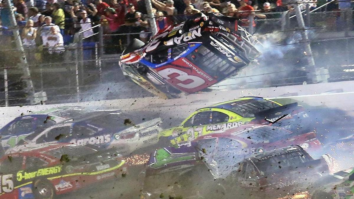 
Austin Dillon (3) goes airborne as he was involved in a multi-car crash on the final lap of the NASCAR Sprint Cup series auto race at Daytona International Speedway early Monday.
