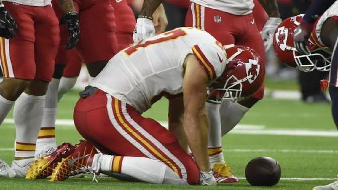 Kansas City Chiefs tight end Travis Kelce was checked on by teammates after he was hit following a catch during the first half of Sunday’s game.