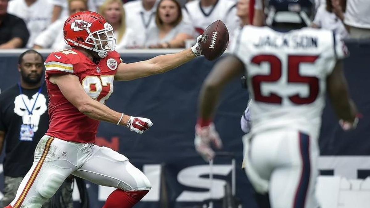 Kansas City Chiefs tight end Travis Kelce prepared to spike the ball in an unusual fashion against the Texans in September.