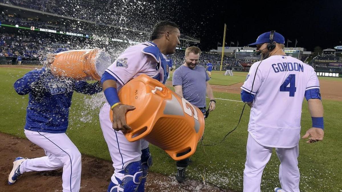Kansas City Royals catcher Salvador Perez gets a shower of his own from Drew Butera after Perez doused Alex Gordon following the 4-0 win over the Detroit Tigers on Thursday.