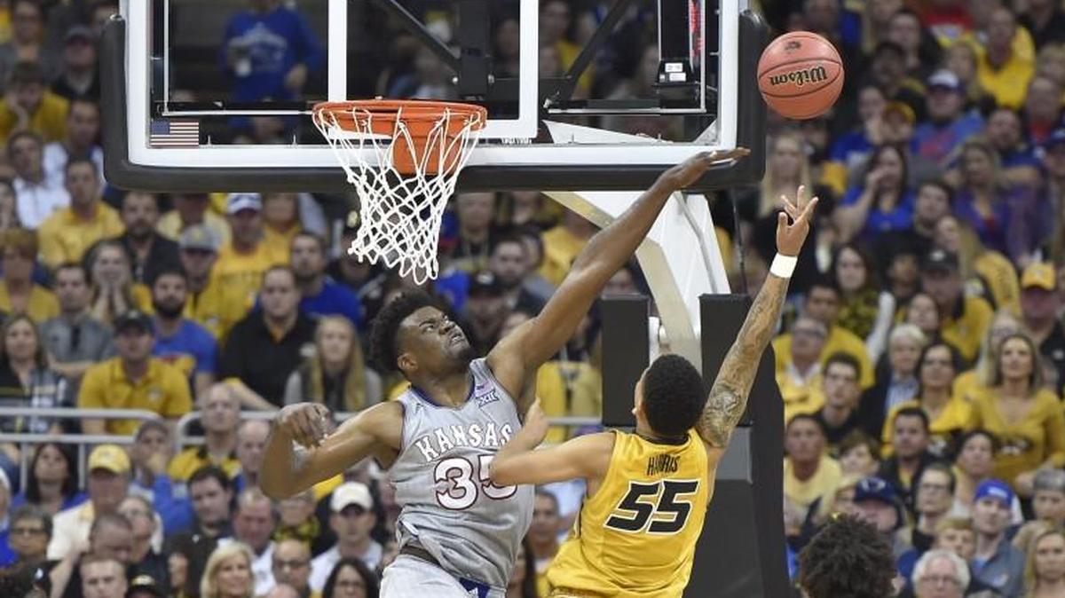 Kansas’ Udoke Azubuike tried to block this by Mizzou’s Blake Harris during the second half of the Showdown for Relief exhibition game at the Sprint Center.