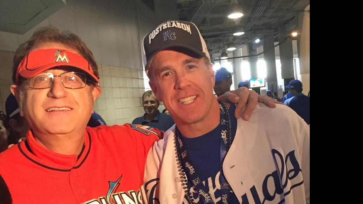 
“Marlins Man” posed for a photo with a Royals fan during Sunday night’s rain delay in Detroit.
