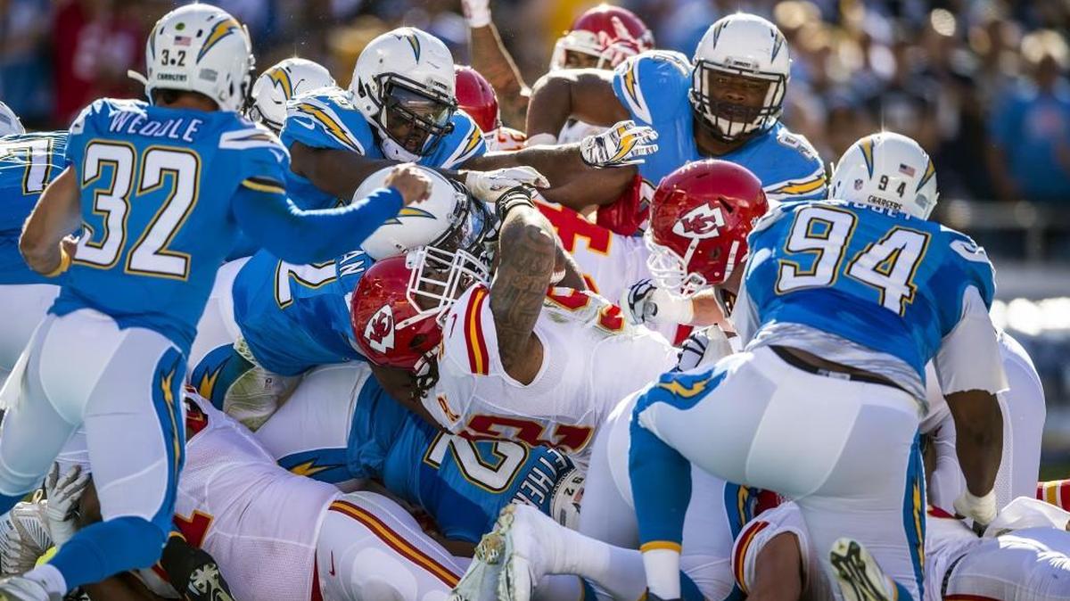 Kansas City Chiefs nose tackle Dontari Poe carried the ball over the goal line against the San Diego Chargers in the first quarter of Sunday’s game.