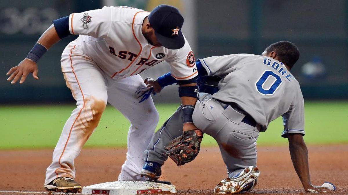 
Kansas City Royals left fielder Terrance Gore’s foot was ruled to have come off the base while Houston Astros third baseman Luis Valbuena tagged him during an attempted steal in the seventh inning during Monday’s ALDS Game 4.
