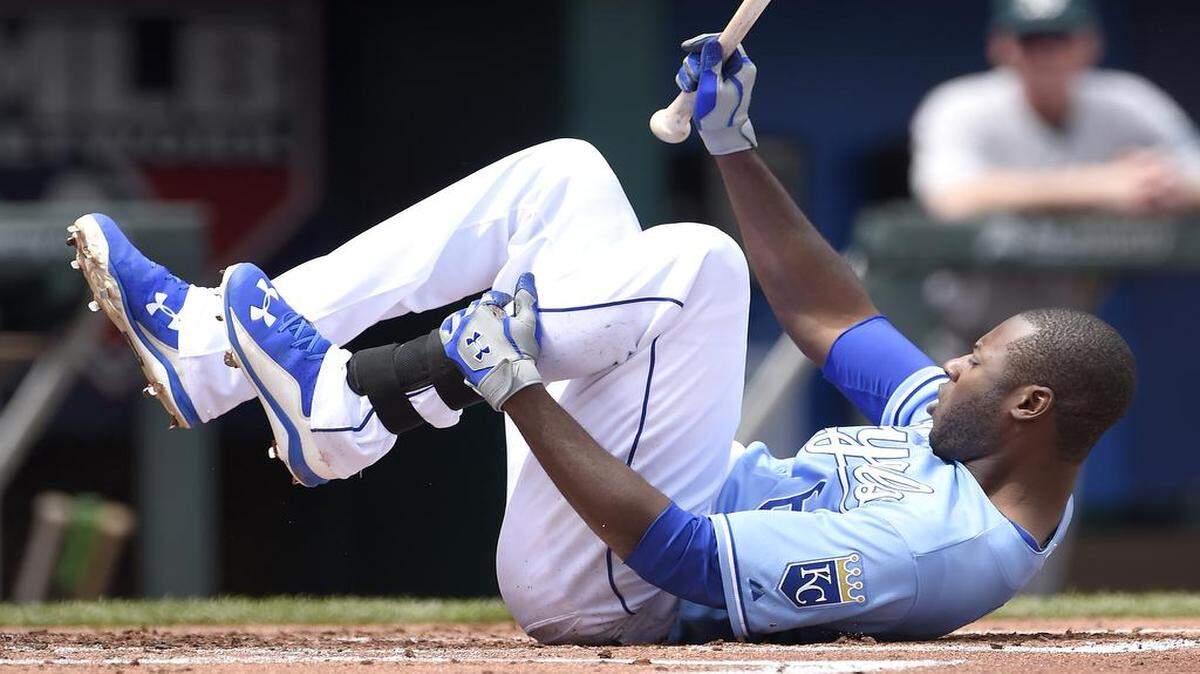 The Royals' Lorenzo Cain was hit by a pitch from Oakland  starting pitcher Scott Kazmir in the first inning during Sunday's baseball game at Kauffman Stadium.

