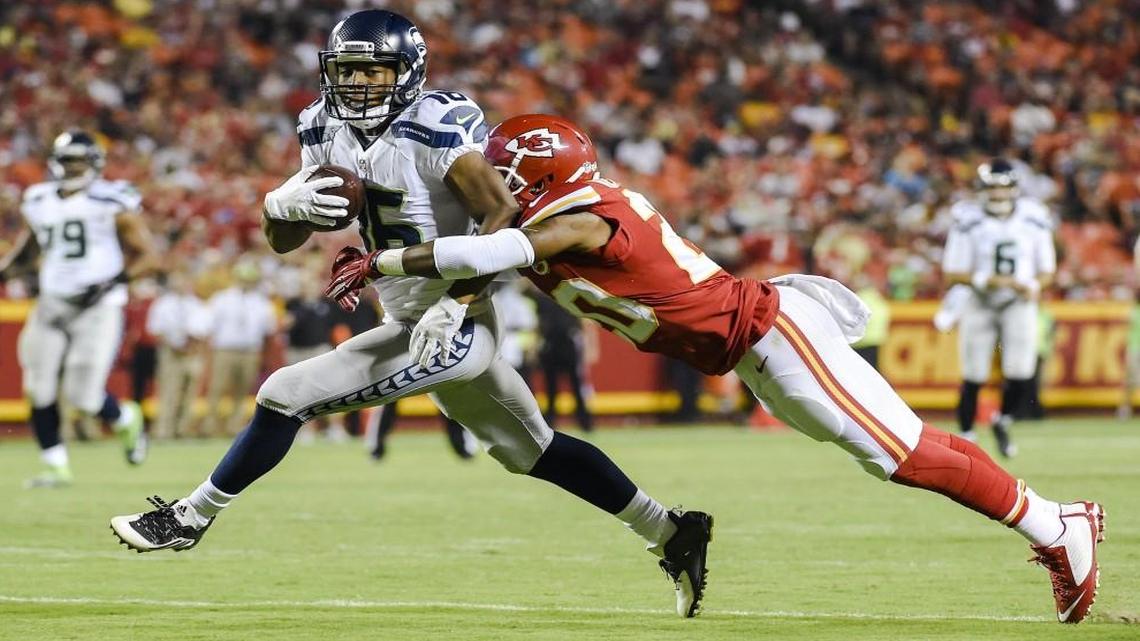 
Seahawks wide receiver Tyler Lockett (16) was bought down by Chiefs cornerback Steven Nelson (20) during an Aug. 21 preseason game at Arrowhead Stadium.
