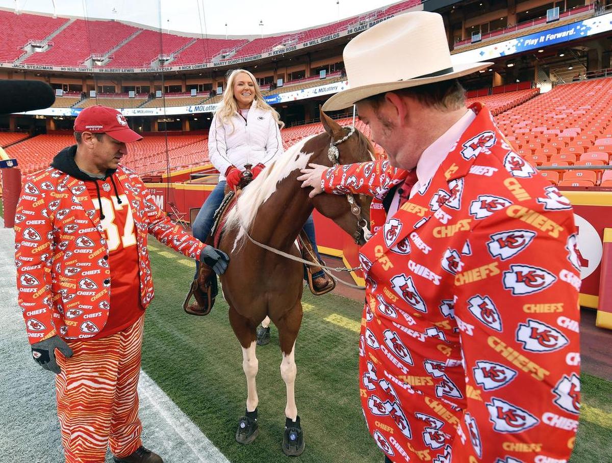 Actors Rob Riggle (left) and David Koechner met Chiefs mascot Warpaint and rider/caretaker Susie Derouchey before a 2016 game at Arrowhead Stadium.