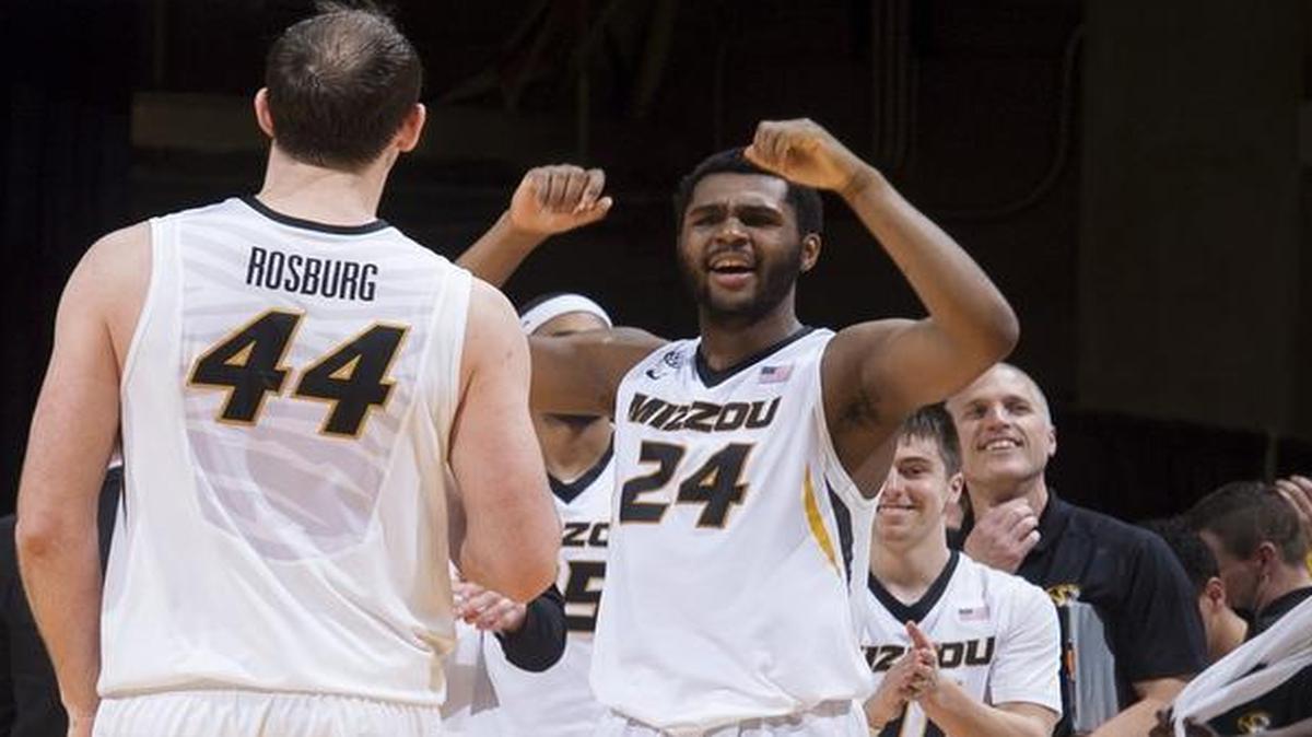Missouri’s Kevin Puryear (right) and Ryan Rosburg celebrated their team’s 72-67 victory Tuesday in Columbia over South Carolina. It was the team’s second straight conference win.