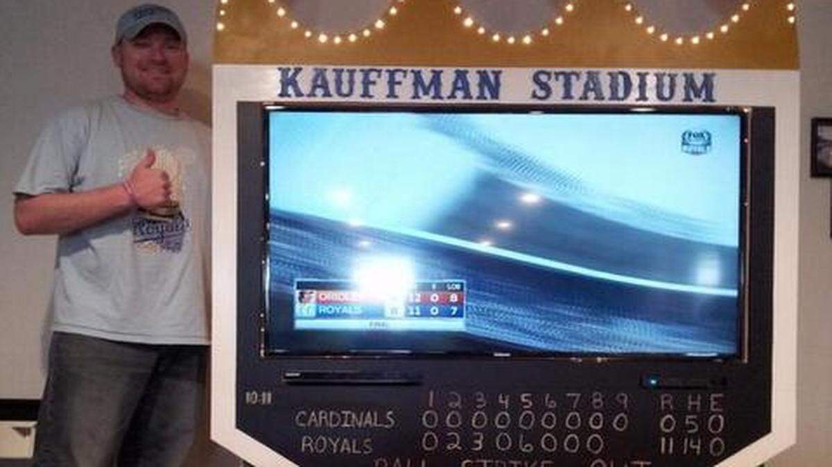 
T.J. Jackson memorialized a key moment in Royals history with a handmade crown scoreboard around his television. But he and other Kansas City sports fans must decide today which Kansas City team will get the TV. 
