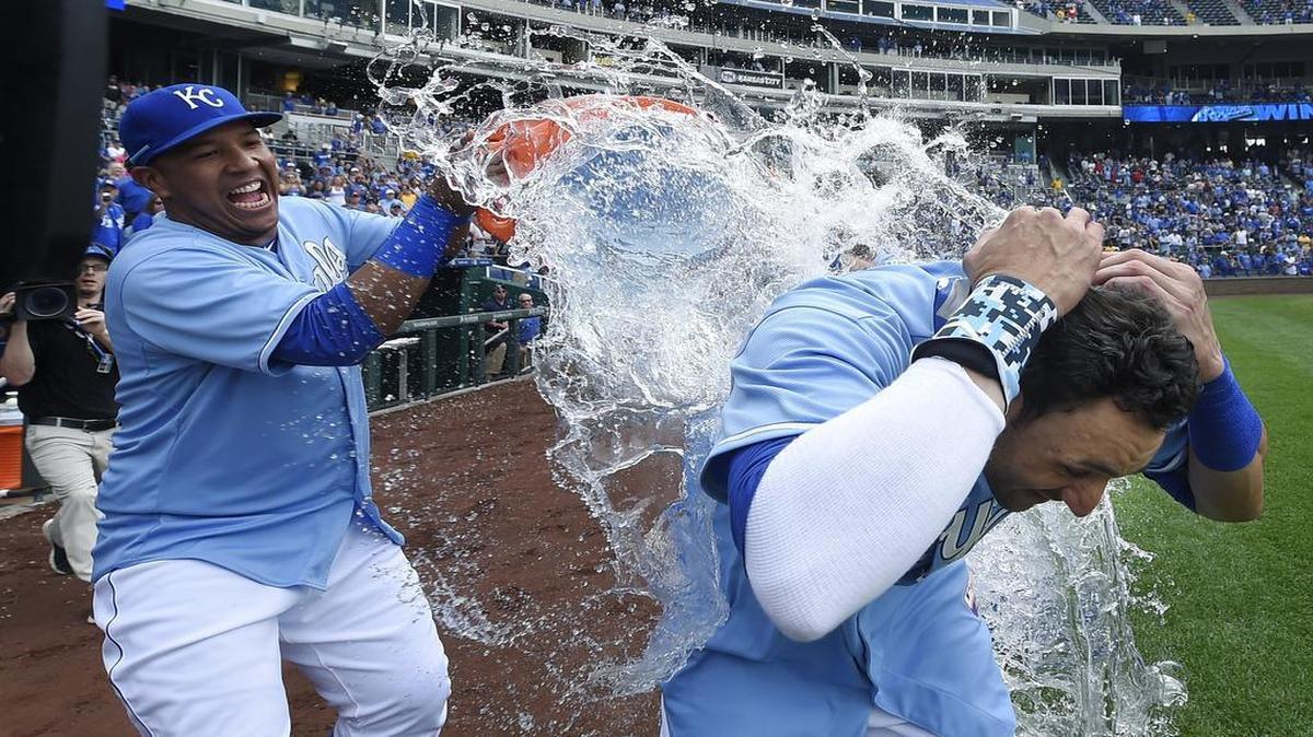 
Paulo Orlando (right) got the water bucket treatment from Salvador Perez after Orlando hit a grand slam in the ninth inning that gave the Royals a 9-5 win over the Tampa Bay Rays on Tuesday at Kauffman Stadium.
