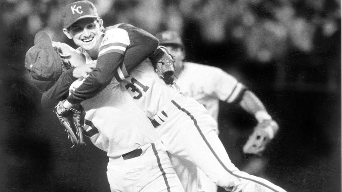 Third baseman George Brett hoists pitcher Bret Saberhagen after the final out against the Cardinals in the 1985 World Series. Brett recalls the game in the new documentary, “Brett.”