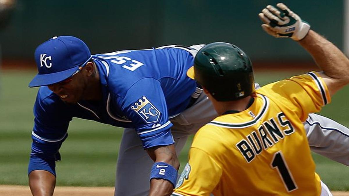 
The Royals’ Alcides Escobar tagged out the Athletics’ Billy Burns on a force-out at second base in the third inning of Sunday’s game.
