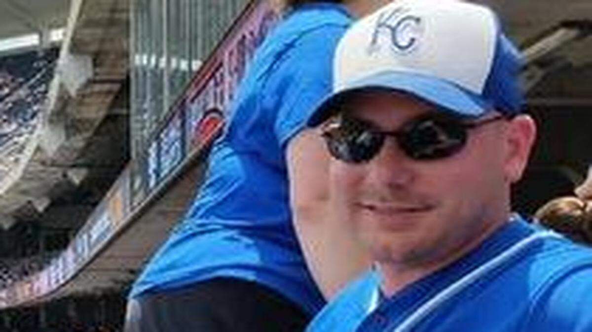 
Tim Grimes, who is fighting melanoma, brought his dog to Kauffman Stadium during one of the club’s promotional days.
