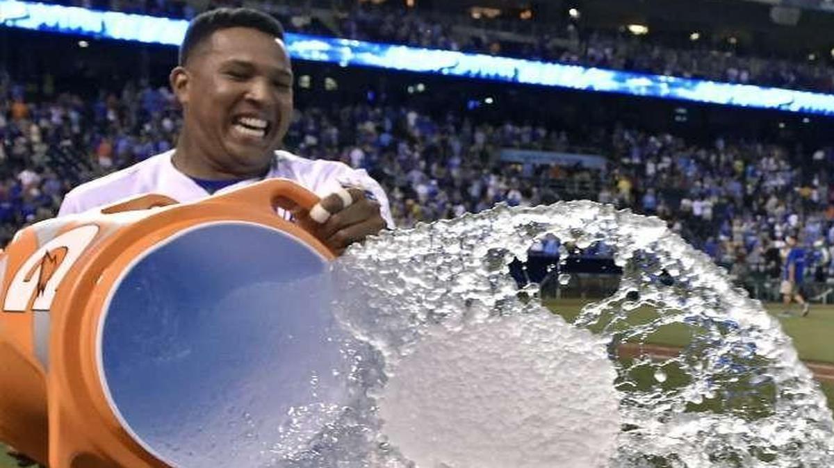 
The Royals’ Jarrod Dyson dodged as teammate Salvador Perez tried to douse him with water after a 3-1 win over the Pirates on Tuesday at Kauffman Stadium.
