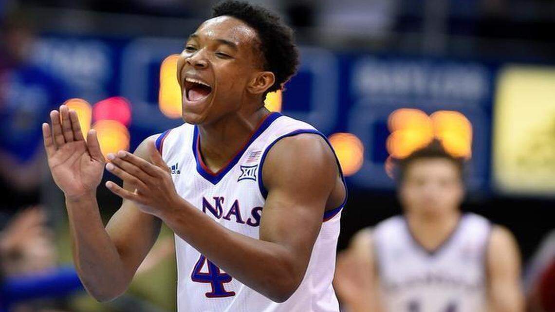 
KU's Devonte’ Graham led the cheers after the Jayhawks forced a Baylor turnover in the first half of Saturday’s game at Allen Fieldhouse, in Lawrence. The No. 8-ranked Jayhawks beat the No. 16 Bears 74-64.
