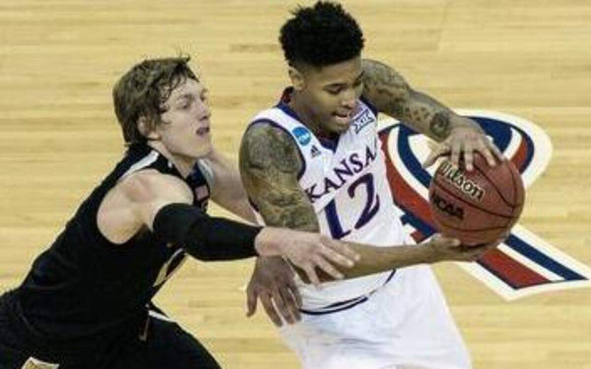 
Kelly Oubre (right) was KU’s best player at times but struggled against Wichita State and Ron Baker in a season-ending NCAA Tournament loss last month in Omaha, Neb.
