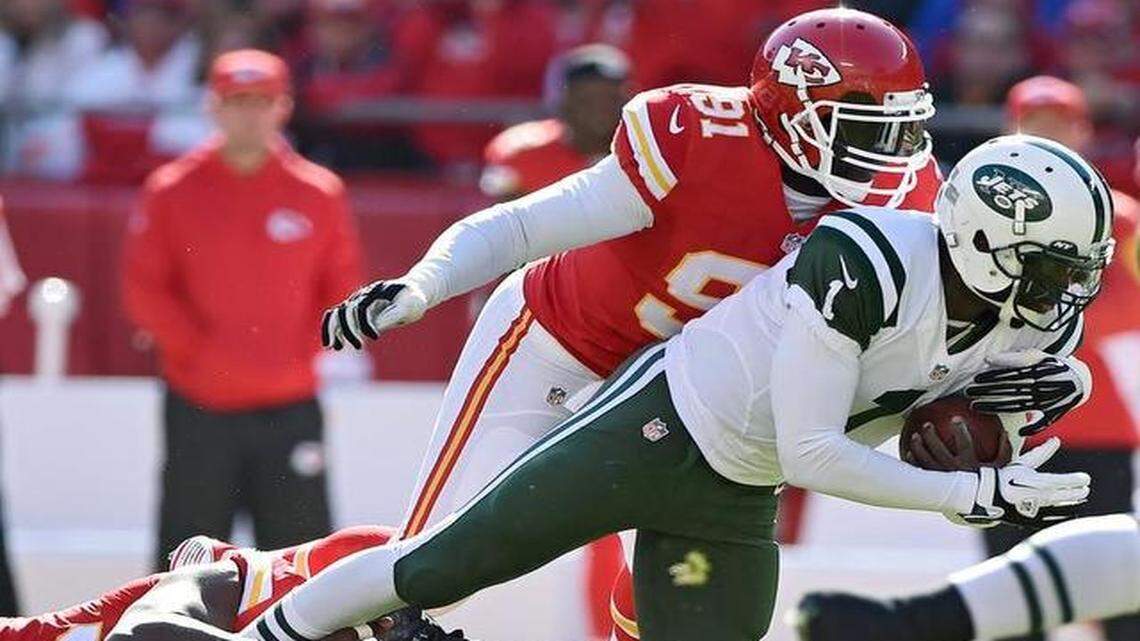
Chiefs linebacker Justin Houston kept a grip on Jets quarterback Michael Vick’s leg for a sack while linebacker Tamba Hali came in to help out in the second quarter Sunday.
