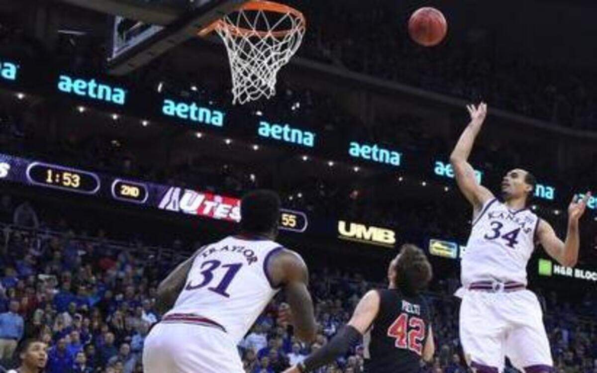 
Perry Ellis’ late bucket over Utah’s Jakob Poeltl helped lift the Jayhawks to a 63-60 win Saturday at the Sprint Center.
