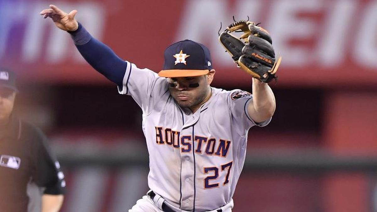 The Royals’ Eric Hosmer slid in safely under Astros second baseman Jose Altuve in the sixth inning of Monday’s game at Kauffman Stadium.