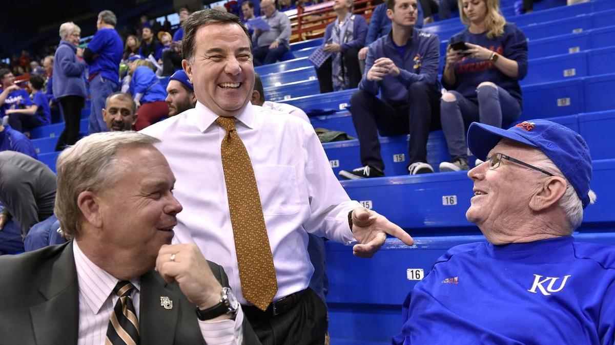 Before KU’s game against Baylor on Saturday, basektball commentator Fran Fraschilla (middle) shared a laugh with former KU broadcaster Bob Davis (right).
